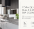 Coifa de ilha preta instalada em cozinha integrada à sala de jantar